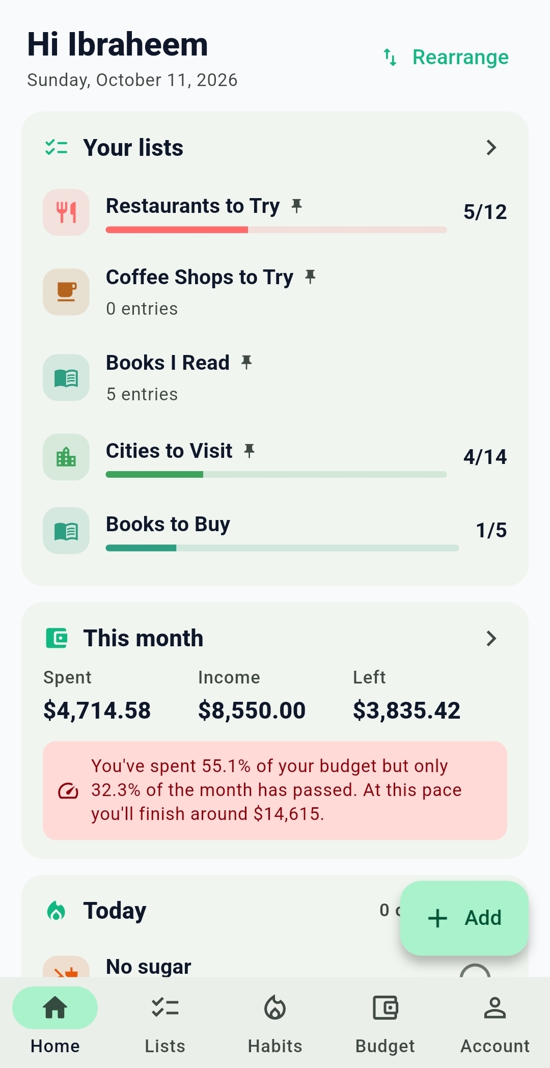 Listy home screen with pinned lists, this month's spending summary and an overspending alert
